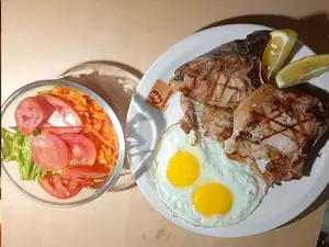 Costillitas De Cerdo 2 + Guarnicion A Elección