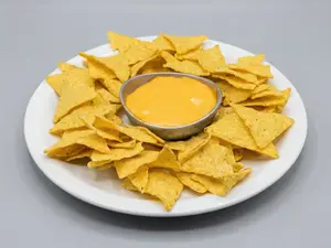 Bandeja de nachos con cheddar