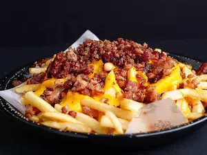 Caja papas con cheddar y bacon