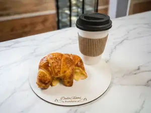 Café + 2 medialunas de manteca