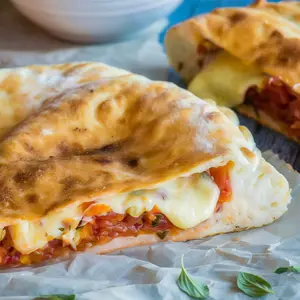 Panini de muzzarella, jamón crudo y rúcula