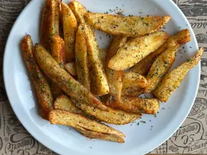 Cuñas de papa al horno