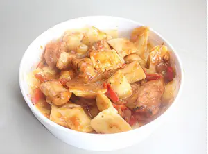 Ravioles con bolognesa