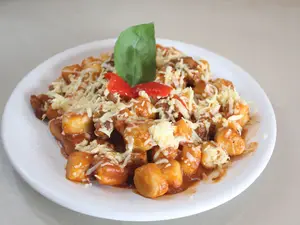 Ñoquis con bolognesa
