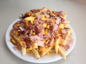 Papas fritas con panceta y cheddar porción grande
