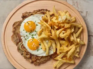 Milanesa(2)a caballo c/fritas