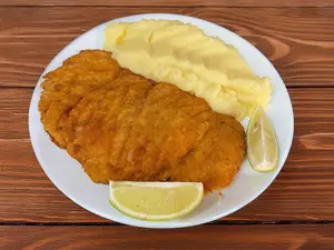 Suprema de pollo con guarn.