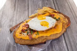 Milanesa a la americana con guarnición