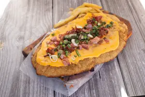 Milanesa con cheddr y panceta