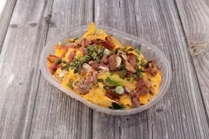 Papas cheddar bancón y verdeo