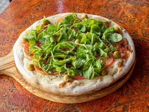 Pizza con rucula