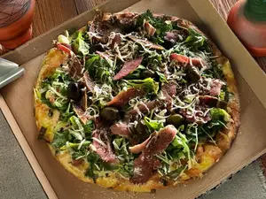 Pizza con rúcula