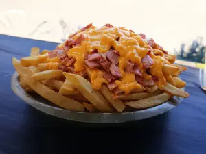 Porción papas fritas c/ j y c