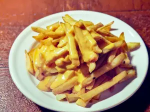 Papas con cheddar