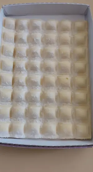 Caja de ravioles ricota y parm