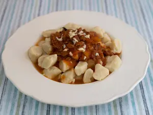2 ñoquis Con Bolognesa Y Saborizada Gde