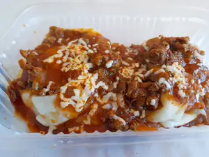 2 porc RAVIOLES verd. con salsa fileto, crema o bolognesa