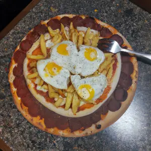PIZZA SHOW 1 COCHINA Y 1 Muzza
