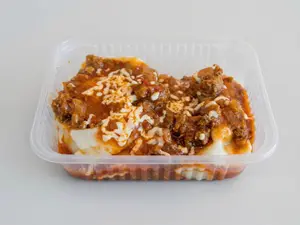 RAVIOLES CASEROS CON BOLOGNESA