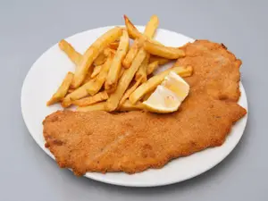 Milanesa o suprema + guarni
