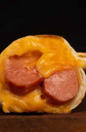 Salchicha Con Cheddar