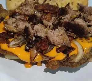 Milanesa Alta Mila