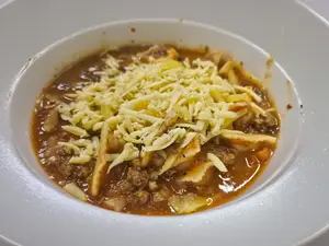 Ravioles Con Bolognesa O Crema