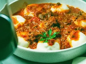 Sorrentinos bolognesa o crema