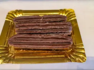 Churro bañado en chocolate
