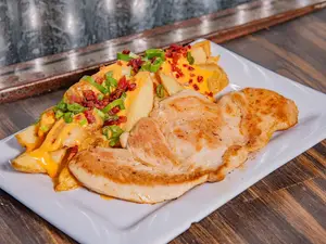 Pollo grillé con guarnición