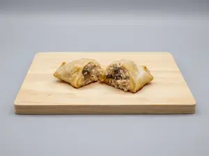 Empanada de pollo al verdeo y champiñones