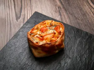 Empanada de roquefort y tomate