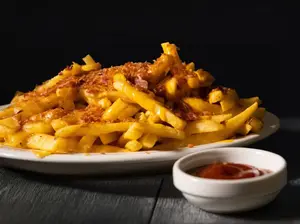 Fritas con cheddar y bacon