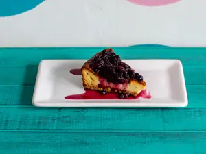 Porción cheesecake
