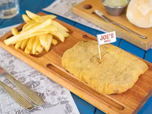 Suprema con papas fritas