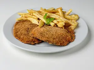 Milanesa de lomo con acompañamiento