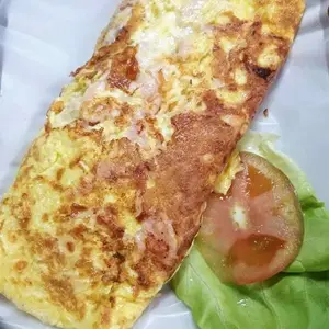 Omelette de jamón y queso
