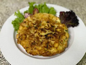 Porcion de tortilla de papas