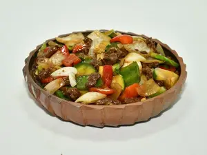 Carne salt.con salsa de ostras