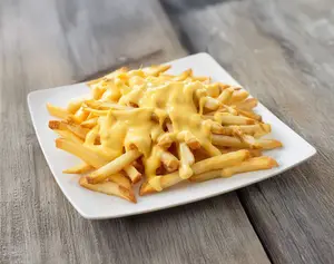 Papas fritas con cheddar