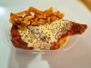 Milanesa napolitana + guarn.