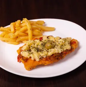 Milanesa a la pizza c/guarnici
