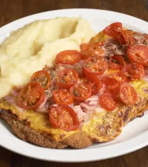 Milanesa cheddar celiaco con guarnición
