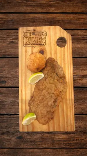 Milanesa de ternera con bomba de papa