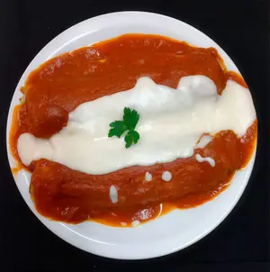 Canelones de verdura con salsa