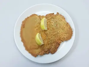 Suprema con papas fritas