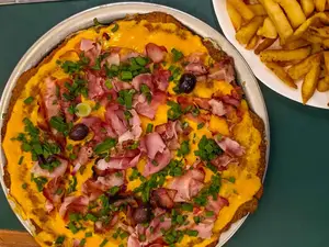 Milanesa cheddar con fritas grande