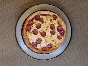 Pizza calabresa grande