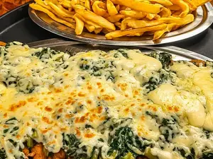 Milanesa fiorentina con guarnicion