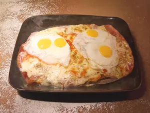 Milanesa muzza con 4 huevos